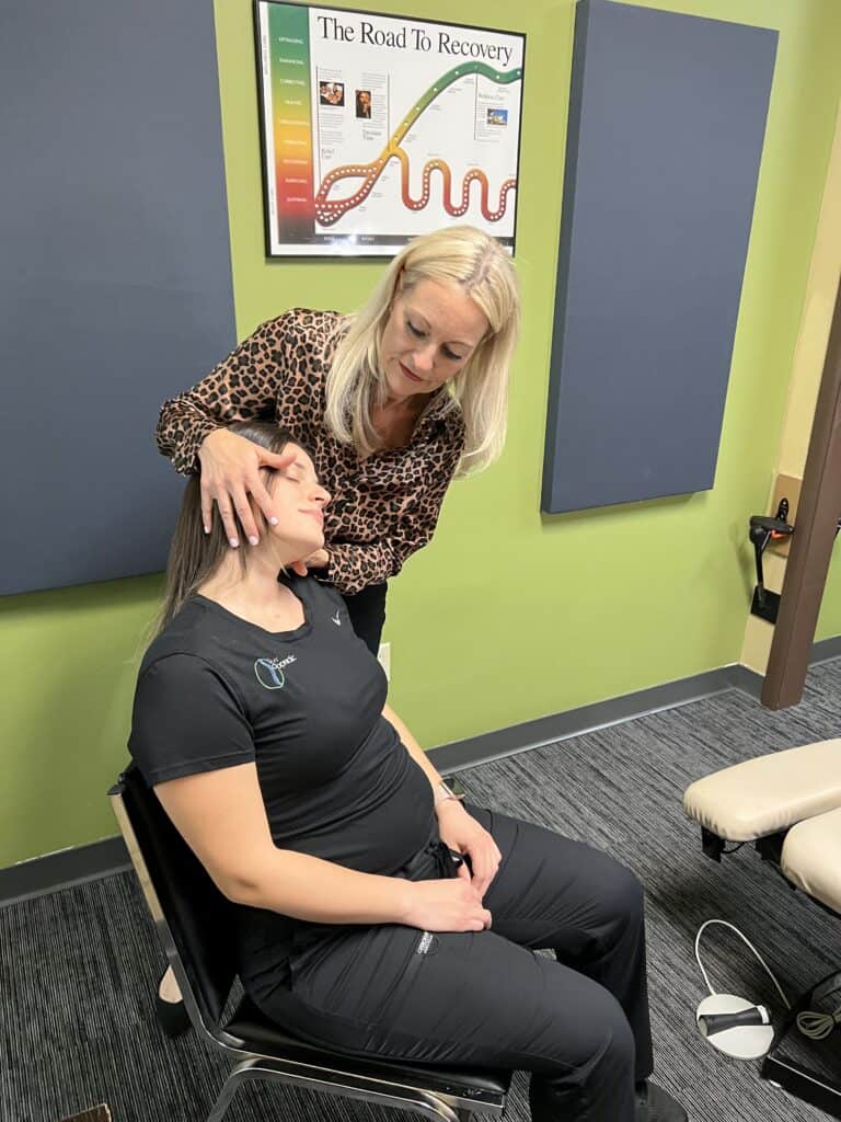 Dr. Shaw adjusting a patient