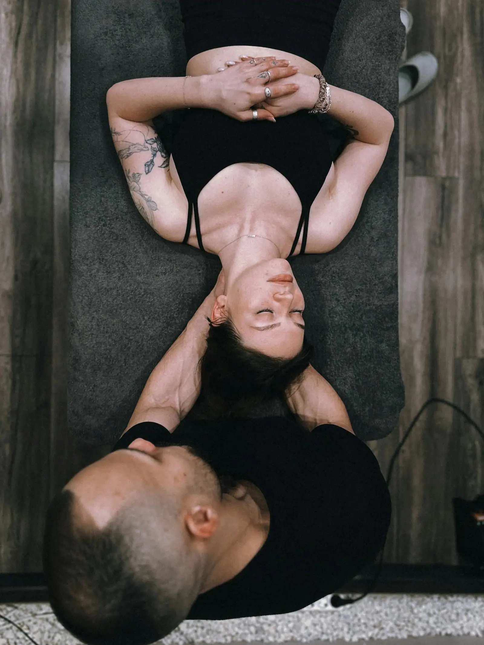 Chiropractor performing a lumbar spinal adjustment on a patient to relieve sciatica