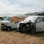 Two damaged vehicles after a minor car accident in a residential area